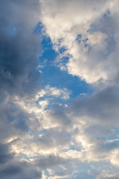 istock dark clouds with white puffy ones and partly blue sky 1633368726