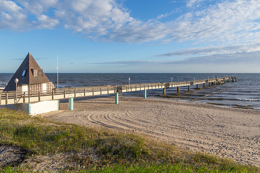 historic beautiful pier at the baltic sea in Ahlbeck Heringsdorf with empty beach in Usedom