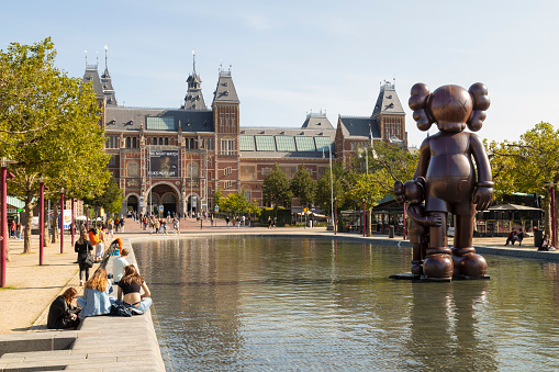 Amsterdam, Netherlands, September 5, 2021; People enjoy the water at the Rijksmuseum (National state museum) in the center of Amsterdam.