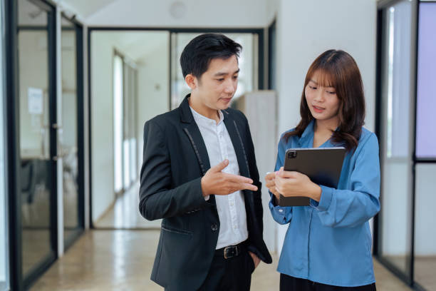 istock training and review with businesspeople in office for networking, communication and planning. 1633389557