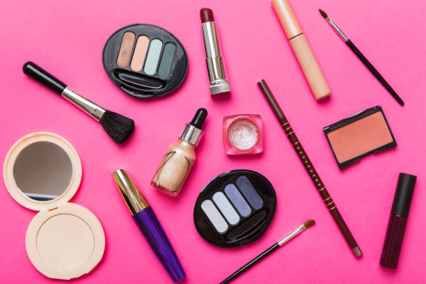 istock Professional makeup tools. Top view. Flat lay. Beauty, decorative cosmetics. Makeup brushes set and color eyeshadow palette on table background. Minimalistic style 1633399420