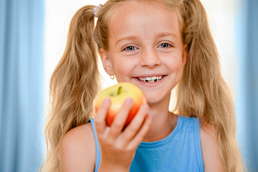 Little Girl with an Apple