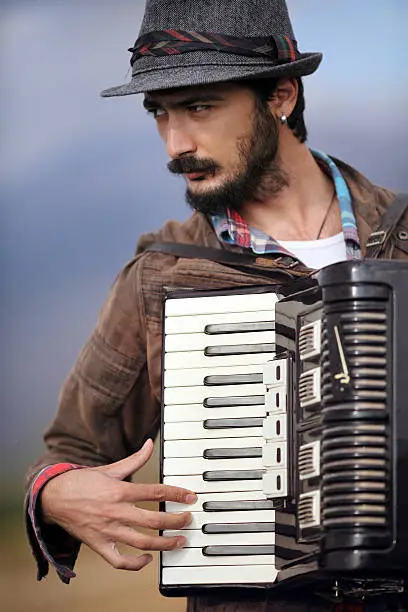 Photo of Man playing accordion