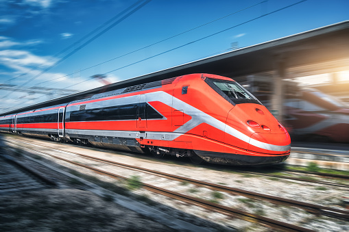 Modern passenger train - empty journey, stop at the platform