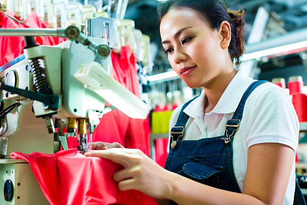 istock Seamstress in a chinese textile factory 163344586