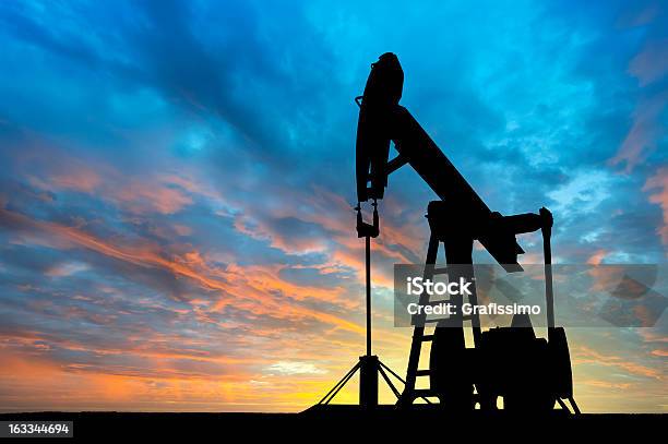 Dawn Over Petroleum Pump Stock Photo - Download Image Now - Oil Pump, Crude Oil, Oil Industry