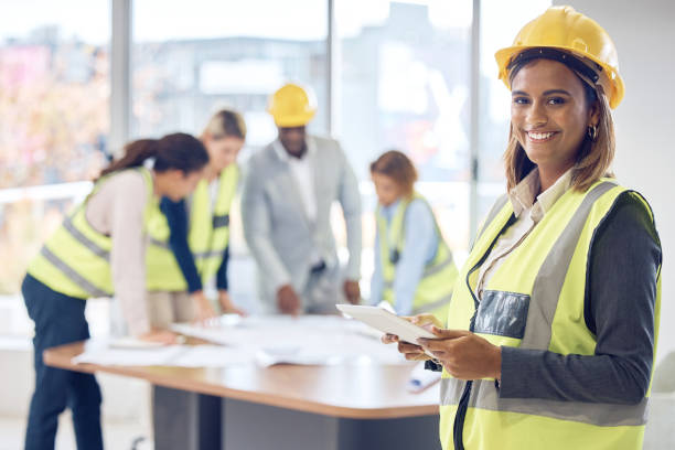 istock Engineering portrait, tablet and woman planning project management, industry and blueprint design in office. Construction worker face, contractor or architecture indian person with digital floor plan 1633448698