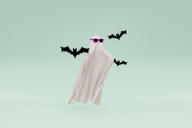 istock Bats and ghost in glasses on green background 1633450922