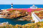 View of Isla Pancha Lighthouse  and seascape in Ribadeo, Lugo  province,Galicia, Spain.