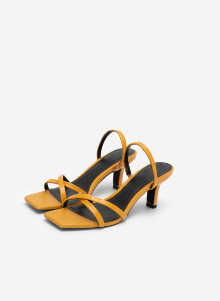 istock high heel sandals isolated on white background 1633462552