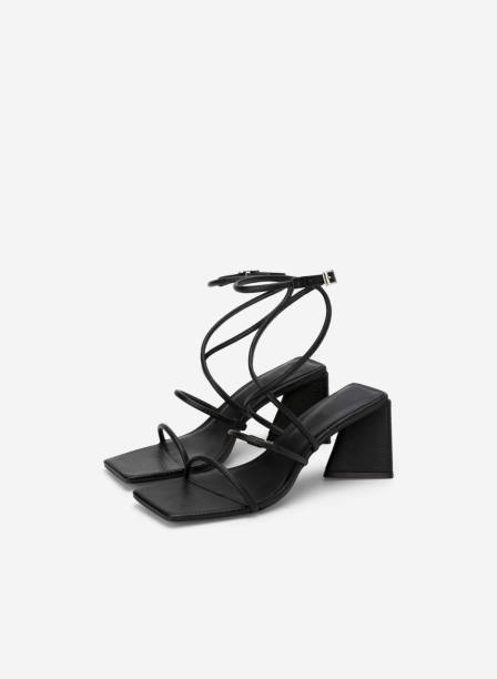 istock high heel sandals isolated on white background 1633462979