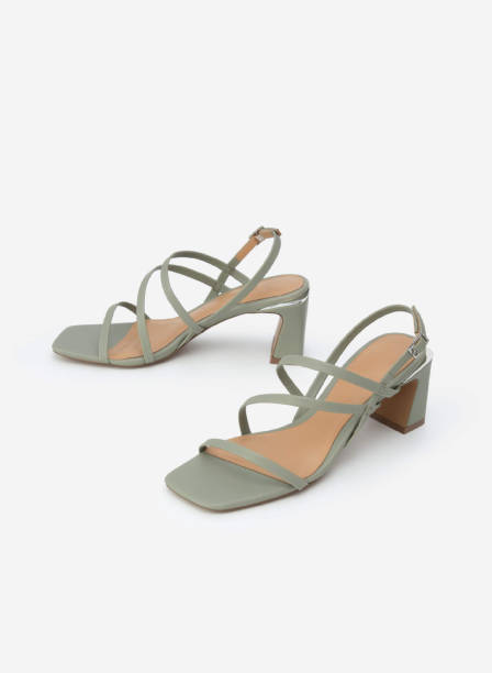 istock high heel sandals isolated on white background 1633464644