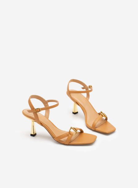 istock high heel sandals isolated on white background 1633466714