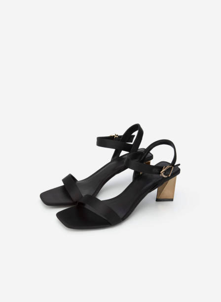 istock high heel sandals isolated on white background 1633468297