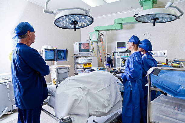 istock Surgery room with surgeon and nurses 163348740
