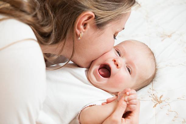 istock Mother play with baby 163348953