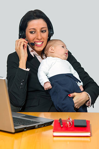 istock Busy mother with her baby 163349322
