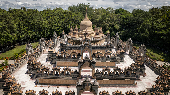 Aerial view sandstone pagoda in Wat Pa Kung Temple or Wat Prachakom Wanaram in Si Somdet district, Roi Et Province, northeast of Thailand.