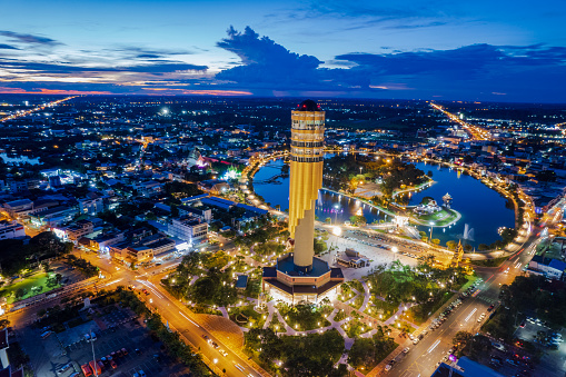Aerial View  Roi et tower or Vote Tower 101 and  Bung Plan Chai  This park in the middle of Roi Et's lake in the city center in sunset time,Province Roi Et Thailand.