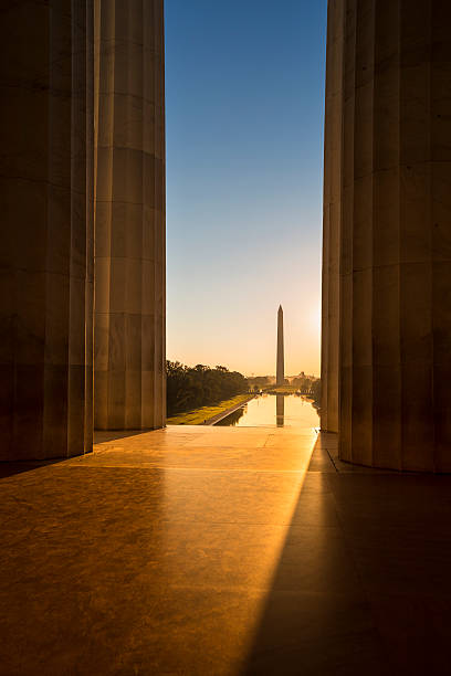 Washington Monument from the Lincoln Memorial Washington DC Monument and the US Capitol Building and grounds viewed from the Lincoln Memorial on The National Mall USA washington monument washington dc stock pictures, royalty-free photos & images