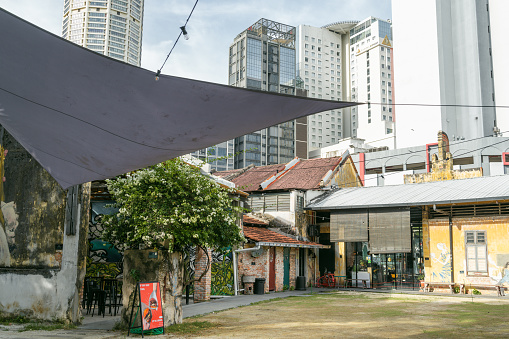 Penang, Malaysia - July 6, 2023 : Georgetown Hin Bus Depot cafe street