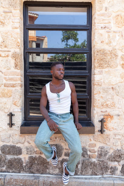 istock Portrait of men sitting winddow 1633536670