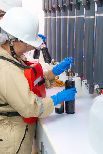 istock Marine chemists collecting data 1633565879