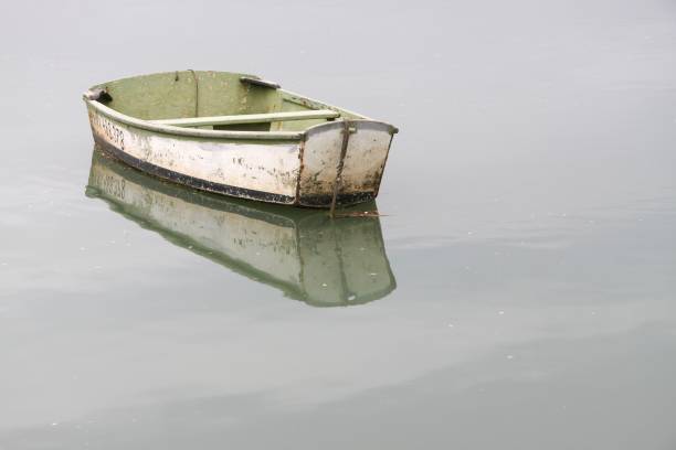 istock Small boat on the sea 1633572980