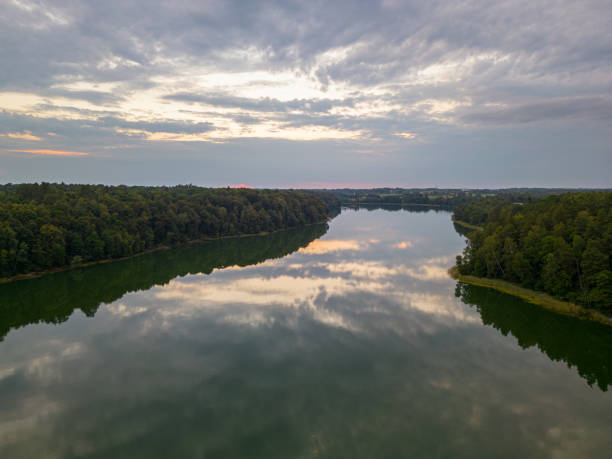 istock Lake in forest at sunset. Oro Dubiningai. Lithuania 1633577318