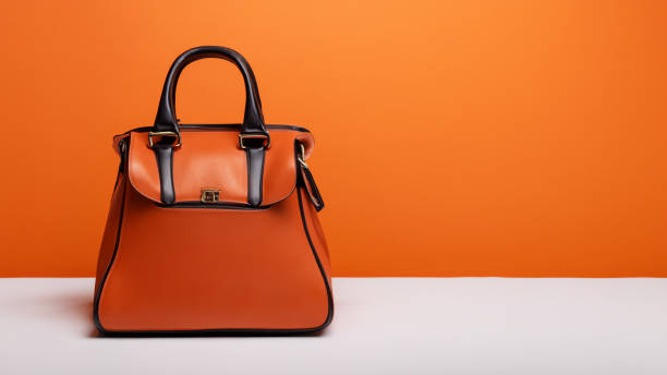 istock Orange lady's bag in the orange room 1633587665