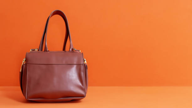 istock Brown lady bag in the orange room 1633587670