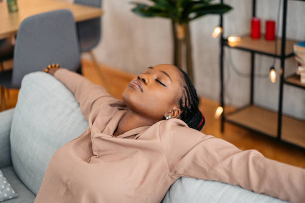 istock Young Woman Relaxing On The Sofa At Home 1633616222