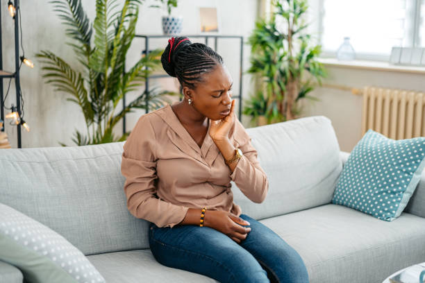 istock Young Woman Having Toothache At Home 1633617342
