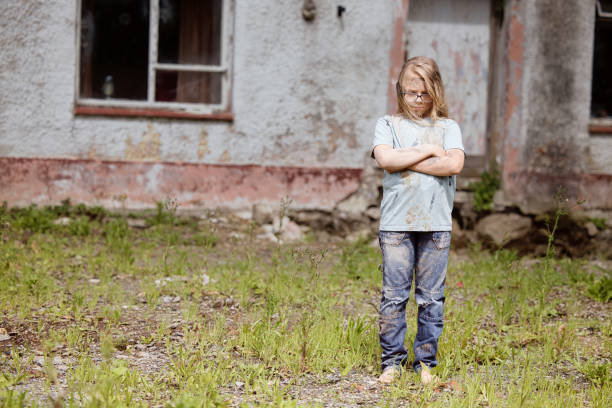 istock Scruffy vagabond girl looking distinctly unfriendly and miserable 1633620566