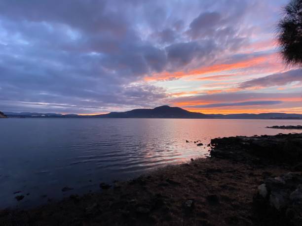 istock Orange Reflection of Clouds in Morning Sunrise. 1633625954