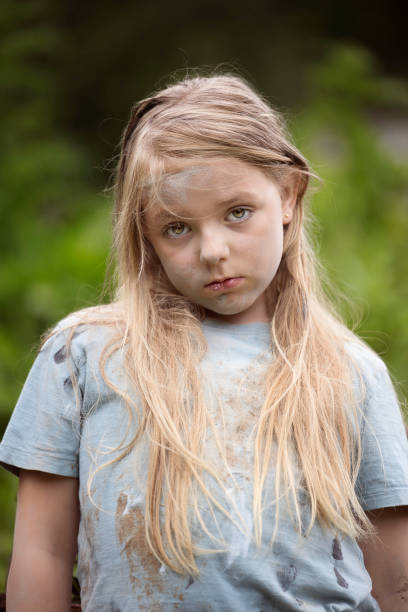 istock Scruffy vagabond girl looking distinctly unfriendly 1633626478