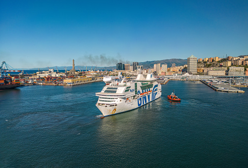 Genoa, Italy- August 7,2023: The drone aerial view of Genoa port and GNV ferry ships.  Grandi Navi Veloci （GNV） is an Italian shipping company, based in Genoa