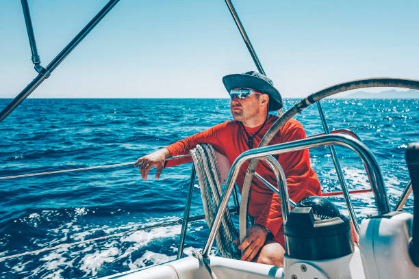 istock Skipper sailing on sailboat during regatta 1633663655