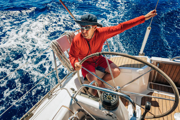 istock Skipper sailing on sailboat during regatta 1633664177