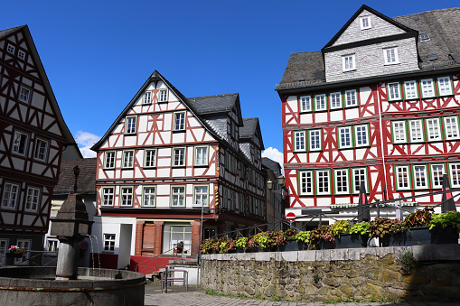medieval courtyard with buildings in the style of half-timbered houses in old town, Switzerland