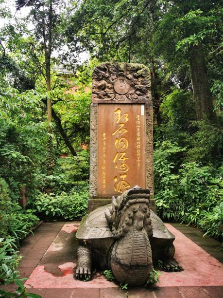 istock taoism mountain statue with ancient characters 1633726323