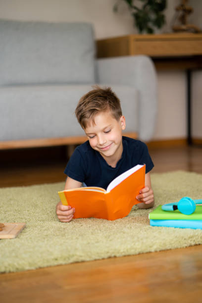 istock Portrait of schoolboy at home 1633731049