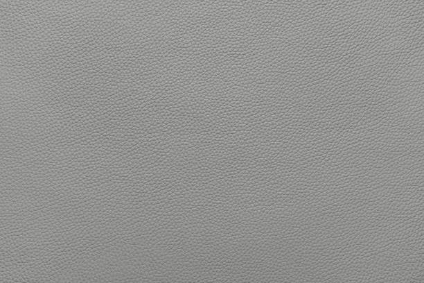 istock Genuine light gray leather, eco friendly leatherette texture background 1633756261