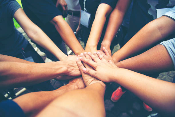 istock Unity strong handshake with people or agreement of feeling or happy team working together 1633794683