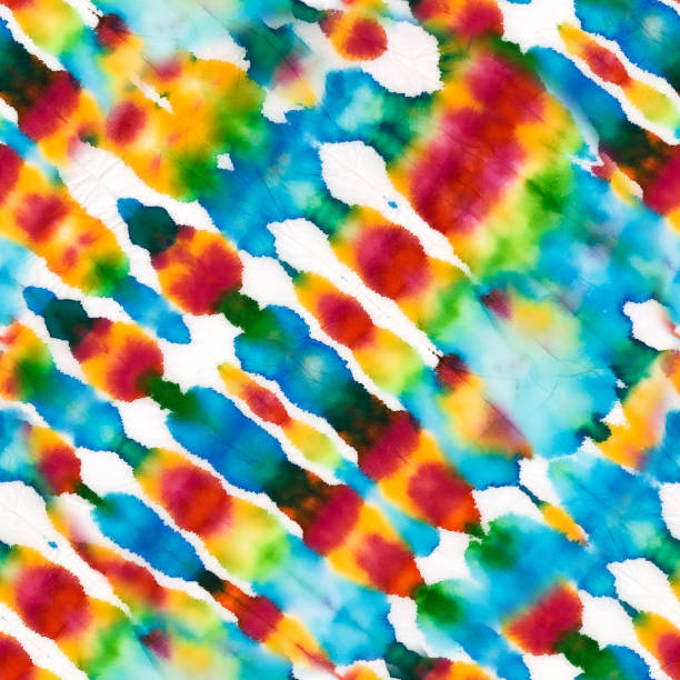 istock Seamless Painted Colorful . Repeated Tie Dye Clothe Background. Seamless Textured Bright Tie Dye Wallpaper Shirt. Repeated Modern Rainbow Tie Dye Cloth Style. 1633797825