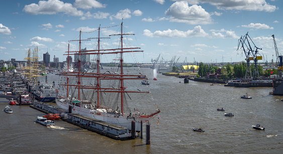 Hamburg, Germany – August 09, 2021: The Rickmer Rickmers in the port of Hamburg, Germany, with the Elbphilharmonie\nin the background