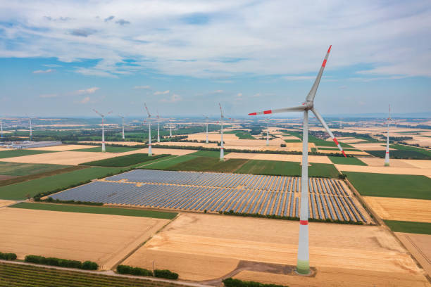 istock Wind turbines and solar panels 1633825707