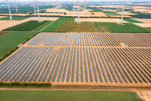 istock Wind turbines and solar panels 1633826245