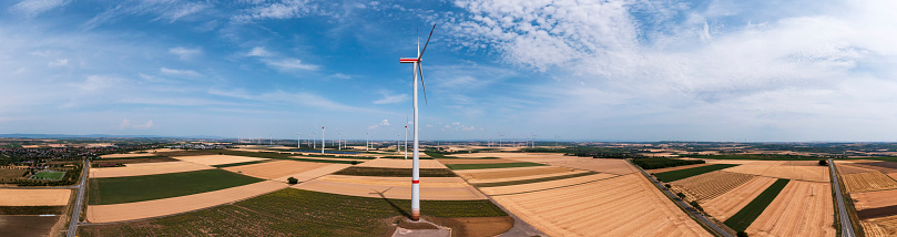 Bird's-eye view of grain fields in Rhineland-Palatinate/Germany and a few wind turbines