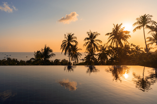 Infinity pool views at a beautiful beach in Bali.